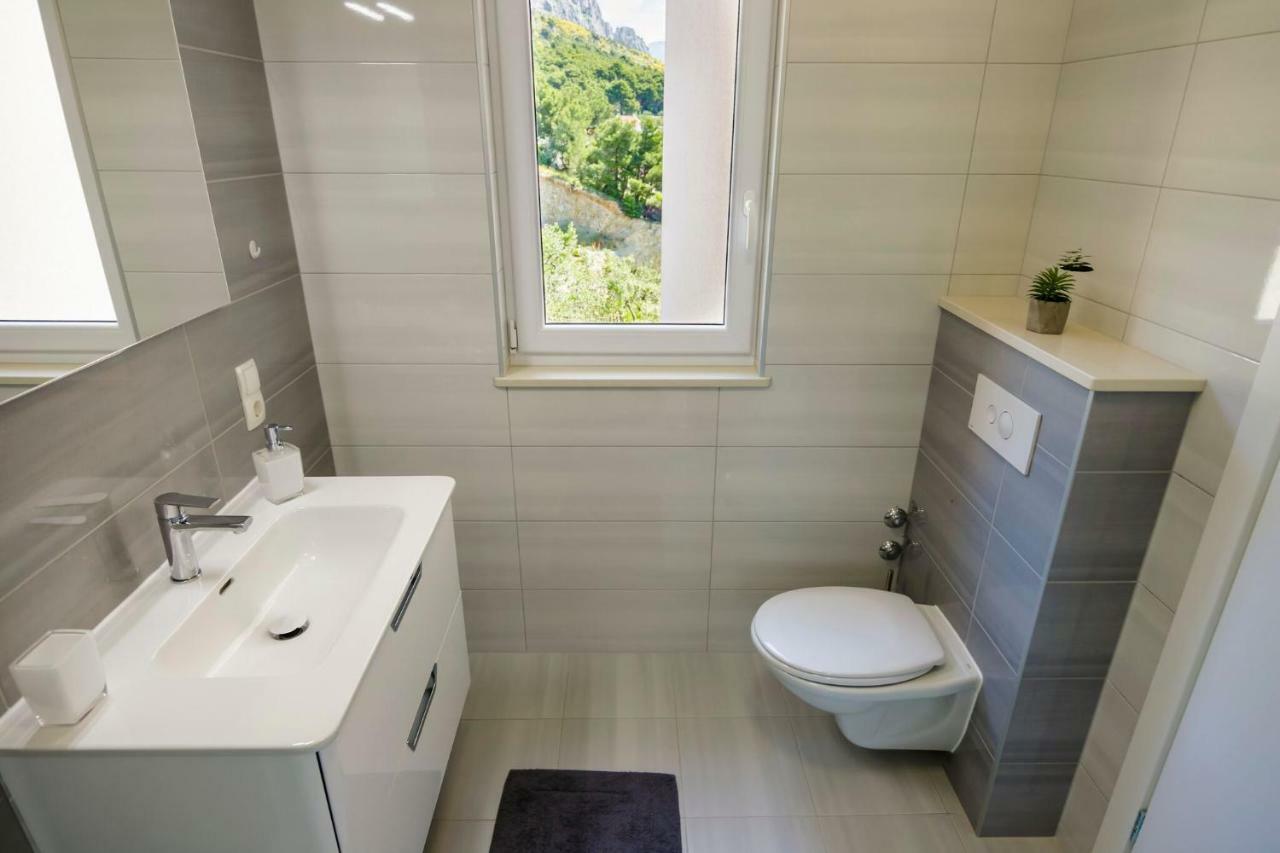 Apartmani Ticinovic 奥米什 外观 照片
